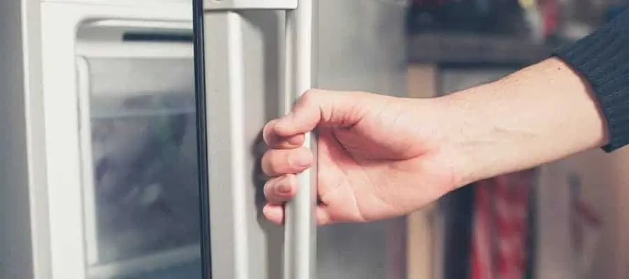 Opening the freezer door