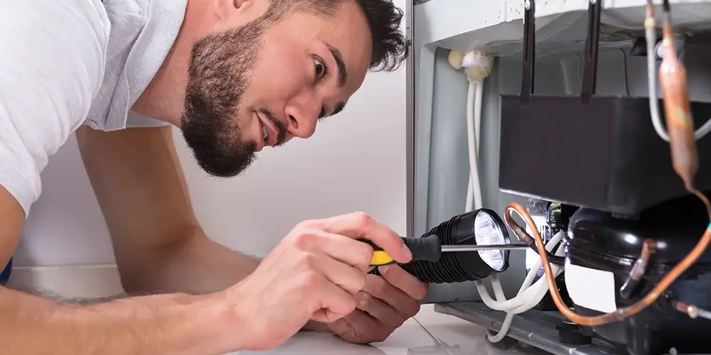 Checking a fridge compressor