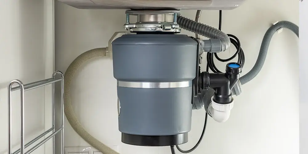 A garbage disposal under the sink