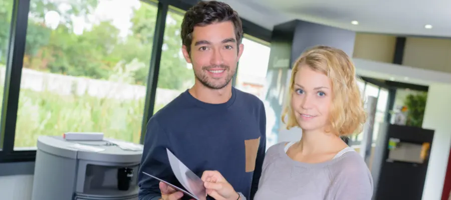 Couple reviewing a furnace manual