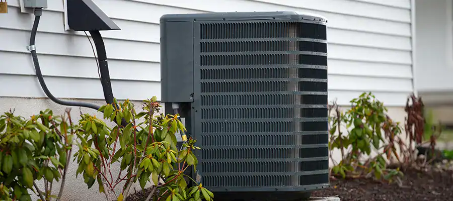 An air conditioner working hard in the summer heat