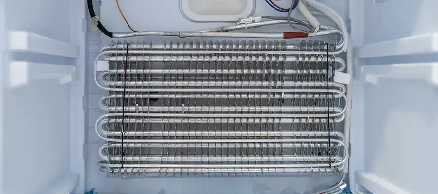 The condensor coils of a refrigerator